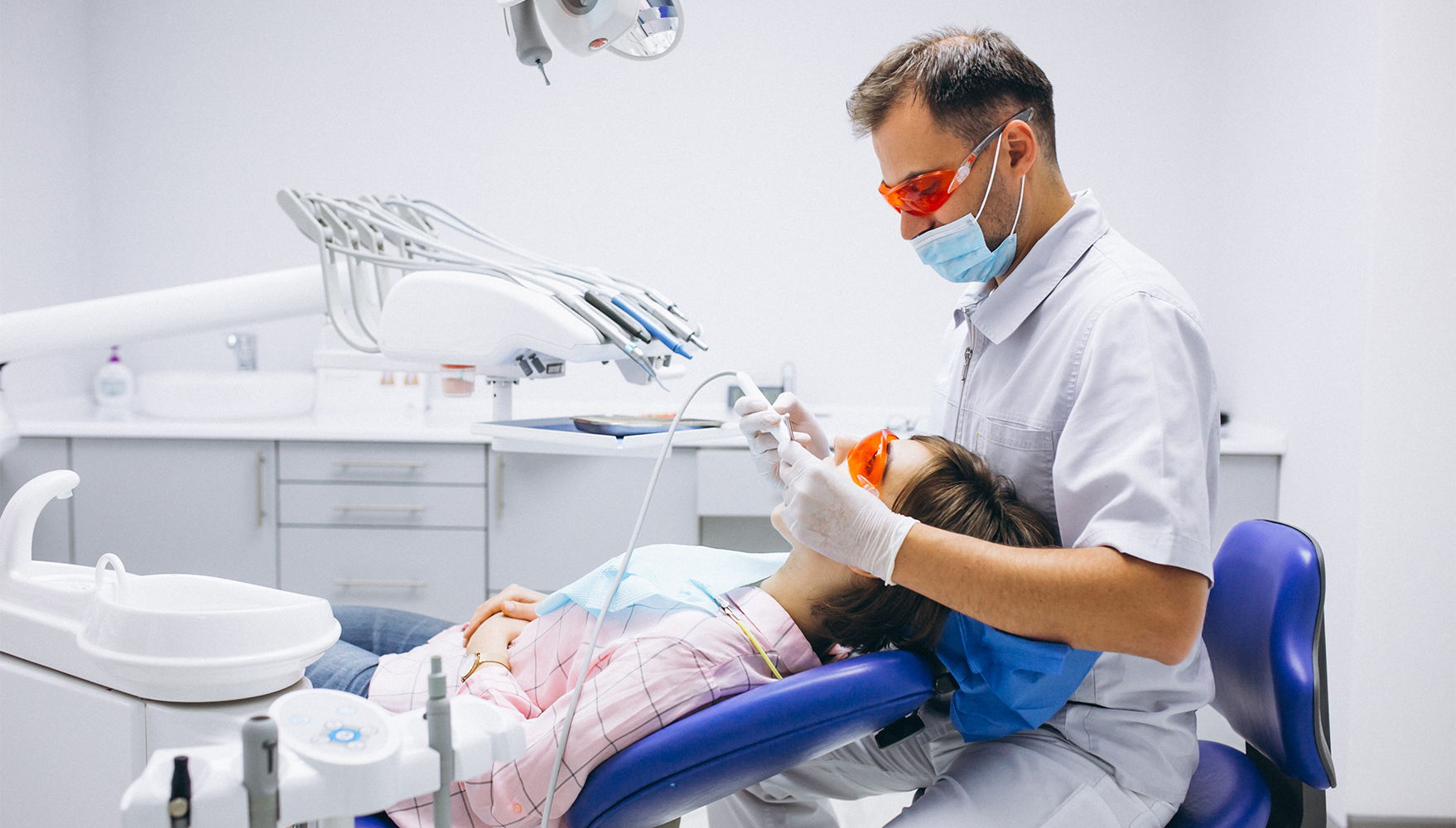 A general dentist in Australia conducting a procedure